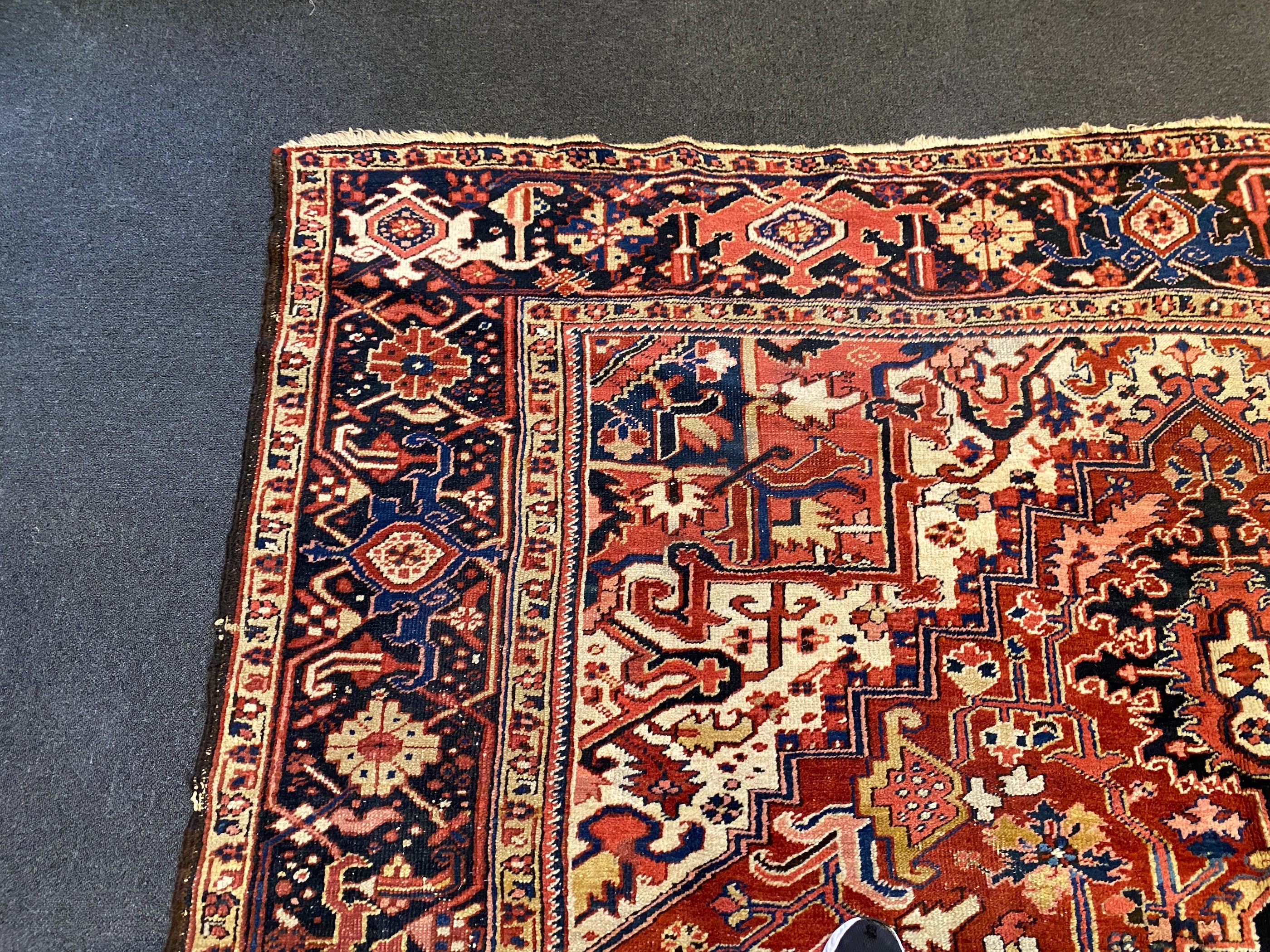 An Heriz red ground carpet, 364 x 265cm